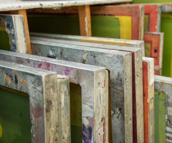 up close of multiple screens in a workshop