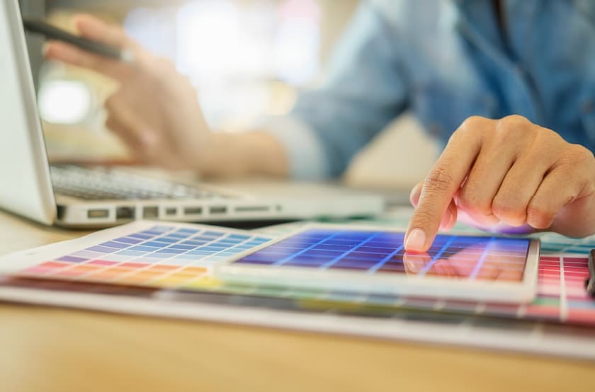 graphic designer reviewing colors
