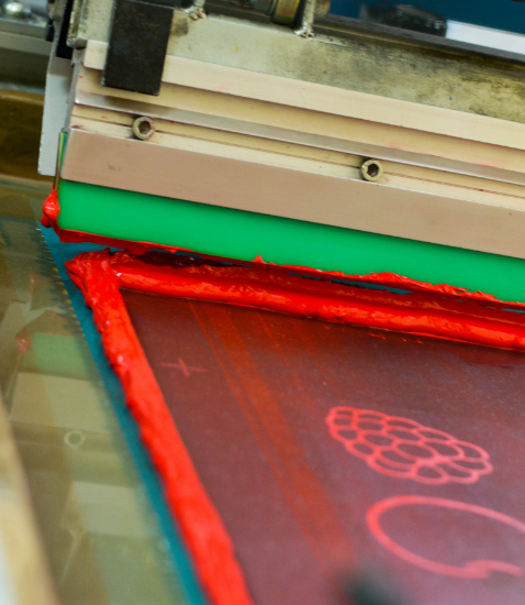 expose-specifications-image red ink being pushed through an exposed screen