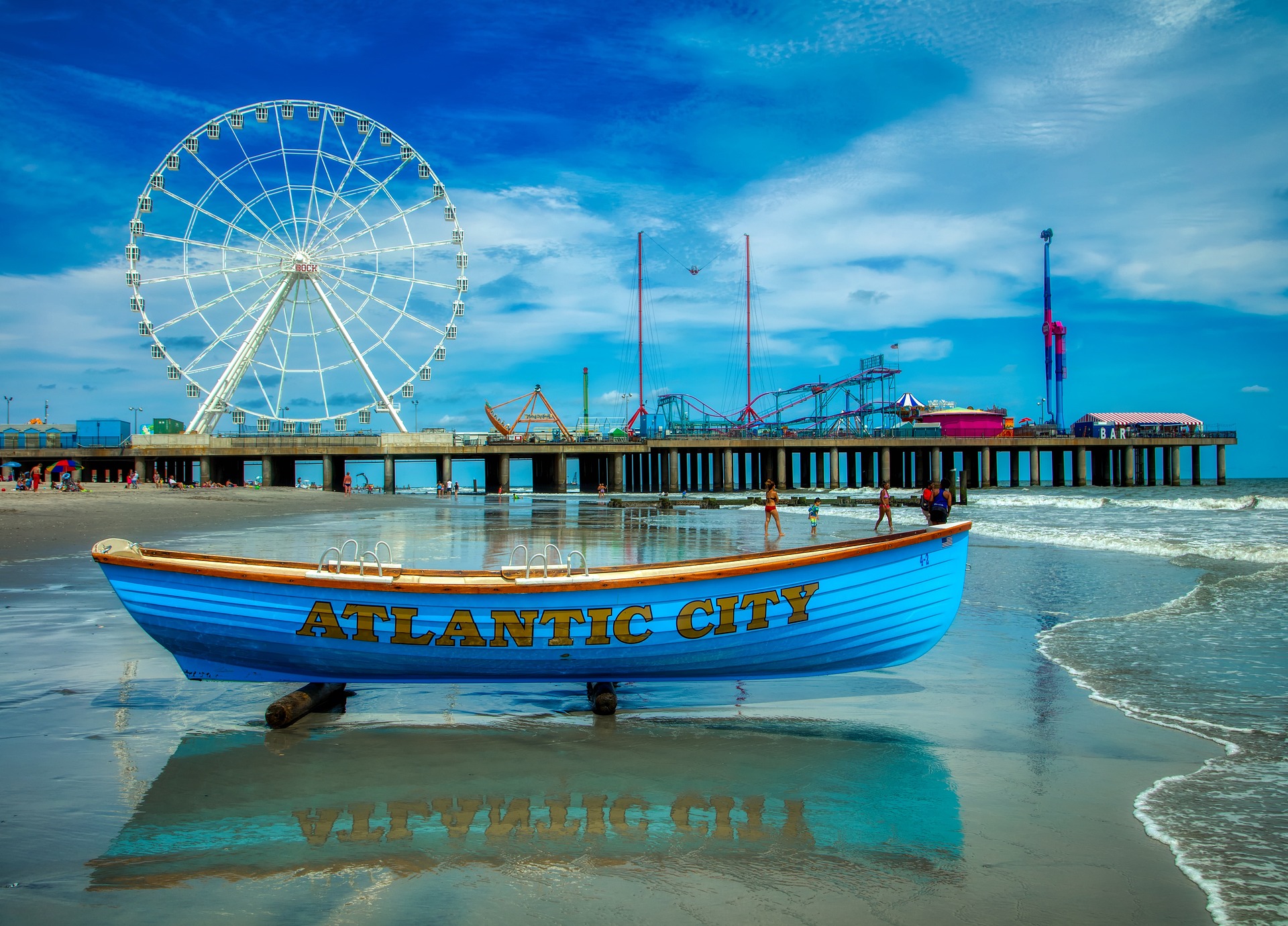 Atlantic City written on a boat on the beach