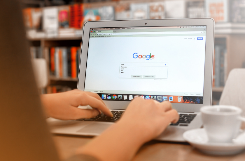 Person using Google search engine