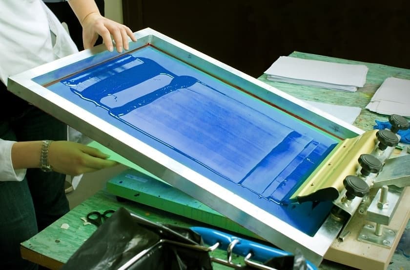 blue ink on a t-shirt press 