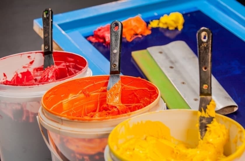 buckets of screen printing ink 