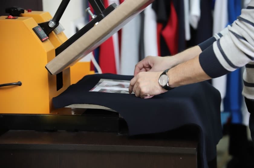 black t-shirt on a heat press 