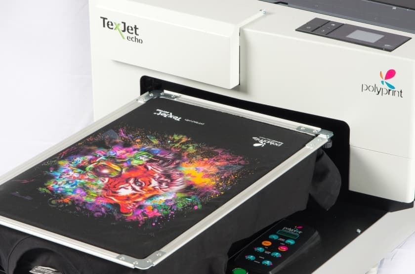 t-shirt being printed onto a shirt 